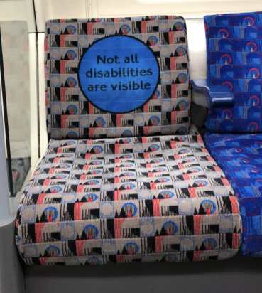 “A picture I took of a London train seat, the back of which says ‘Not All Disabilities Are Visible’”