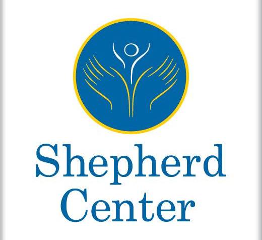 Logo of the Shepherd Center. A blue circle with yellow hands with a white figure in the middle. The words in blue text against white background says, Shepherd Center
