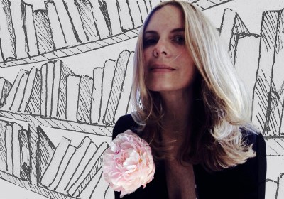 Collage of an Ink pen drawing of many books on a bookshelf and a color photograph of a woman wearing a black blouse with a pink peony pinned on the left lapel. The color photograph is superimposed upon the ink pen drawing.