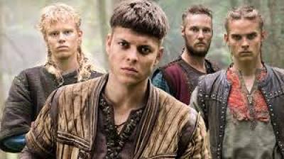 Image description: screenshot from an episode of Vikings, an original series on the History Channel. Ivar the Boneless is a young Viking warrior with short dark hair. He is in the foreground of the image with three brothers behind him: Sigurd, Ubbe, and Hvitserk.