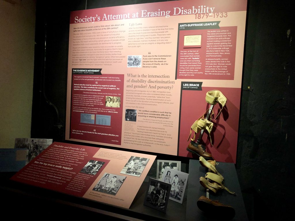 Museum exhibit on disability showing a leg brace and photos with the with the title "Society's Attempt at Erasing Disability." Photo courtesy of Gann Academy. Photo credit: Maya Wainhaus