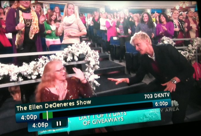 Screenshot from The Ellen Show where Ellen Degeneres is dancing with a person in a wheelchair.