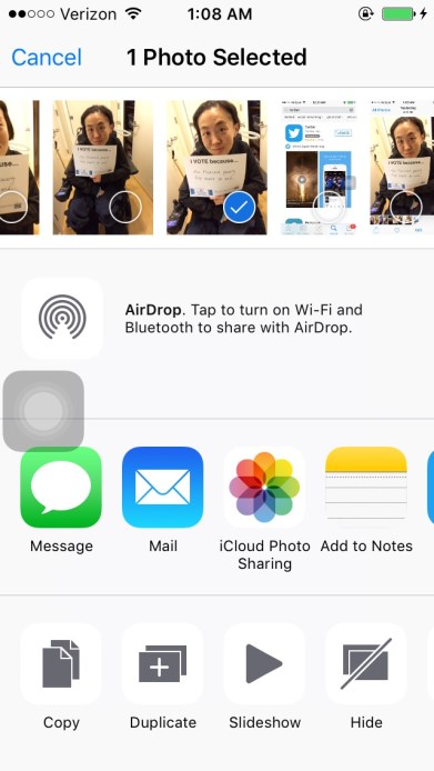 Screenshot of an iPhone's photo app with one image selected among a row of other photos. Below are options to share the image on various apps, via text, email and other sites.