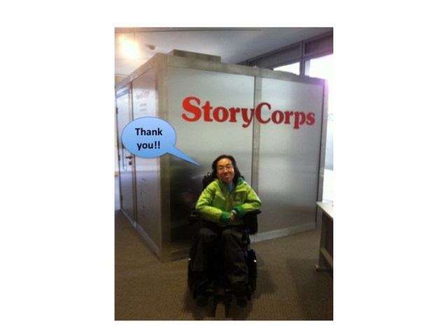 Asian American woman in a wheelchair in front of a StoryCorps recording booth. A blue caption bubble says, "Thank you!"