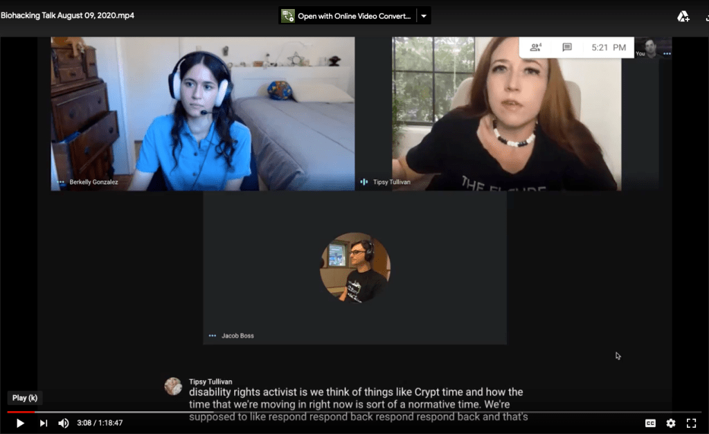 A screen grab of a Google Meet. Top left square: Berkelly is a woman in her mid 20s with dark brown hair wearing a blue button up short sleeved shirt and a headset with light pink headphone cushions. She is sitting at a desk in a bedroom and is taking notes throughout the video. Top right square: The Cyborg Jillian Weise is a white woman with reddish-brown long hair sitting on a beige chair. She is wearing a black short sleeve tee-shirt that reads "The Future Is Accessible." Behind her, there is a window with the blinds open and green leaves outside. Middle square: Jacob Boss’s avatar. He is a white man with wavy medium-length brown hair. The caption reads: “we think of things like Crypt time.” The Google AI has mistranslated “crip time” for “Crypt time.”