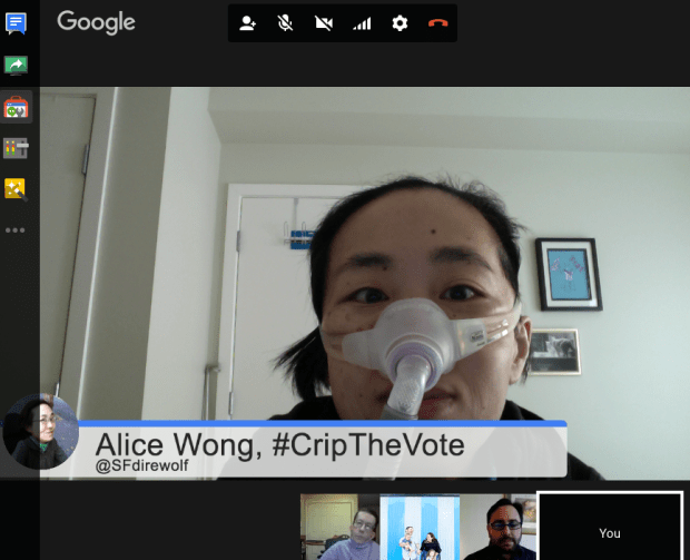 Screenshot of a Google hangout. An Asian-American woman with short black hair. She is wearing a mask around her nose with a tube. There is a horizontal panel below her that reads, Alice Wong, #CripTheVote @SFdirewolf